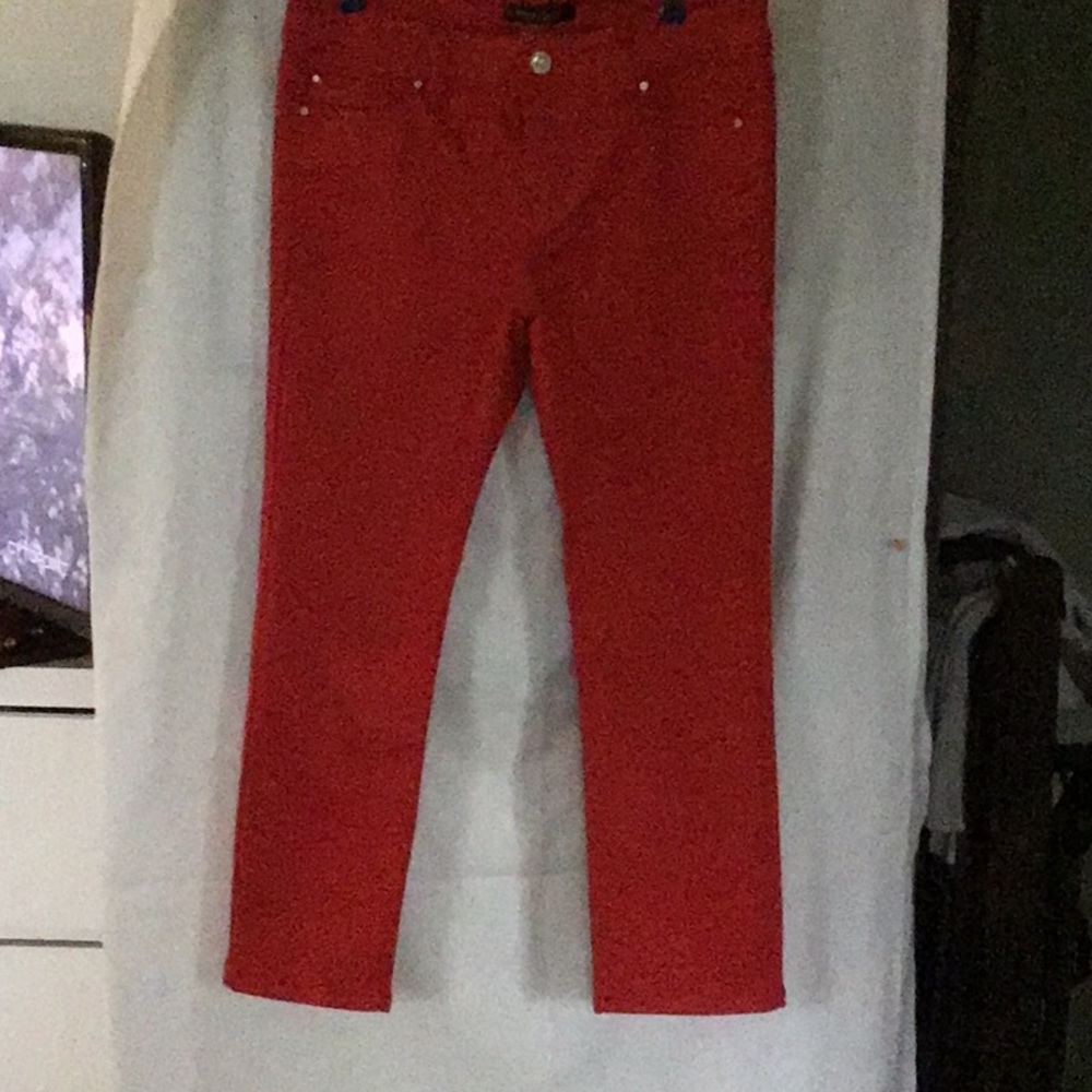 Brand new beautiful red capris size. 2 woman